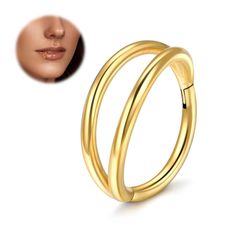 two gold rings with a woman's face in the background and an image of her nose