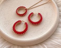 💖 Surprise your mom with a stunning Christmas gift that she will cherish forever! This women's red and gold jewelry set is the perfect present for any special occasion. Handmade with care, this unique set includes seed bead hoops and a boho necklace pendant choker Make this holiday season extra special with this one-of-a-kind jewelry set! These beaded hoop earrings are comfortable to wear all day long * MATERIALS * It is made of high quality Japanese seed beads. Because of it's shape there is n Red Round Jewelry For Valentine's Day, Red Hoop Jewelry For Festive Occasions, Festive Red Hoop Jewelry, Beaded Jewelry Christmas Gift, Beaded Jewelry For Christmas Gift, Gold Round Beads Jewelry For Christmas, Christmas Beaded Jewelry Gift, Christmas Jewelry Gift For Her, Red Jewelry Christmas Gift