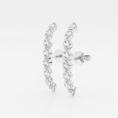 Add a contemporary flair to your jewelry collection with the Ethereal Suspender Earrings. The long row of round lab grown diamonds creates a dazzling line along your earlobe, perfect for elevating your outfit on special occasions. Take your confidence to new lengths with these beautiful 14K gold and lab grown diamond suspender earrings! Formal White Gold Linear Earrings With Single Cut Diamonds, White Diamond Linear Earrings With Prong Setting, Modern Diamond Earrings With Prong Setting For Evening, Classic Diamond Ear Climbers For Anniversary, Elegant Diamond Accented Ear Climbers For Formal Events, Elegant Wedding Ear Climbers With Diamond Accents, White Prong Setting Linear Earrings Fine Jewelry, Fine Jewelry Linear Earrings With Prong Setting In White, Elegant White Gold Linear Earrings With Single Cut Diamonds