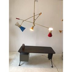 a table with some lights hanging from it