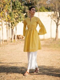 Yellow Printed Cotton Sunny Side Up Tunic Dress - Trendroots Traditional Yellow Spring Tunic, Traditional Yellow Tunic For Spring, Summer Yellow Block Print Kurta, Yellow Long Sleeve Summer Kurta, Summer Yellow Kurta With Block Print, Long Sleeve Yellow Kurta For Summer, Spring Yellow Cotton Kurta, Spring Long Sleeve Pintuck Kurta, Spring Long Sleeve Kurta With Pintucks