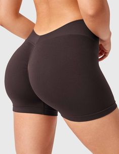 Show off your figure in style while experiencing the highest level of comfort with these high-waisted, seamless shorts that help accentuate your peach butt more effectively. The pure nylon fabric is skin-friendly and flattering, and the workout shorts feature four-way stretch material that wicks away moisture and promotes compression and support, designed to provide you with maximum comfort and flexibility throughout your workout. The style plus back waist v-shape design accentuates the figure a Compressive Shapewear Shorts, High-waist Compressive Seamless Biker Shorts, Compressive Seamless Short Bottoms, High Stretch Solid Color Seamless Athletic Shorts, Solid Color Workout Brief Shorts, Solid Color High Stretch Seamless Athletic Shorts, Solid Color Brief Workout Shorts, Seamless Compressive High-waist Shorts, High Stretch Seamless Shorts