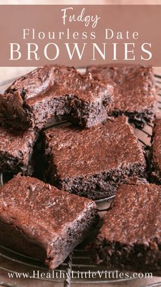 chocolate fudge brownies stacked on top of each other with text overlay that reads fluffy flourless date brownies