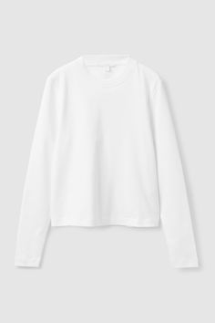 Crafted from organic cotton that’s soft to the touch, this long-sleeve top is cut for a close fit with a slightly cropped hem.   - Round neck - Organic cotton is grown from non-genetically modified seeds without chemical fertilizers or pesticides  100% Organic cotton / Machine washable Back length of S is 54.2cm Cut Sweatshirts, Fashion Wishlist, Contrast Collar, Pesticides, T Shirt Vest, Striped Long Sleeve, White Long Sleeve, Oversized Tshirt, Black And Navy