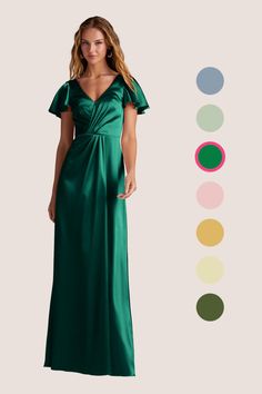 a woman in a long green dress standing next to different color swatches and colors