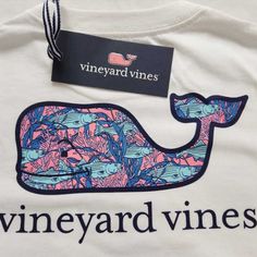 Brand: Vineyard Vines Description: Bass Coral Whale Short Sleeve Pocket Tee Soft Washed Cotton T-Shirt Self Cuffs And Hem Ribbed Collar Classic Relaxed Fit For Everyday Wear Striped Bass Coral Whale Fill Graphic On Chest And Back Imported 100% Cotton Machine Wash Style 3v011621 Sizes Available: Boys 5, 6, 7, M (12-14), L (16) Sku Numbers: (5) 96176, (6) 96175, (7) 96174, (M) 96179, (L) 96178 Vineyard Vines Shep Shirt Outfit, Vineyard Vines Shirts Women, Vineyard Vines Logo, Vineyard Vines Pullover, Vineyard Vines Boys, Baseball Shorts, Soccer Tees, Vineyard Vines Whale, Pocket Tee Shirts