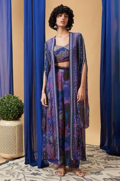 Blue Bohemian Outerwear For Festive Occasions, Festive Blue Outerwear With Resham Embroidery, Festive Blue Outerwear With Floral Embroidery, Festive Blue Party Outerwear, Blue Embroidered Outerwear For Party, Blue Embroidered Party Outerwear, Party Blue Embroidered Outerwear, Party Embroidered Blue Outerwear, Festive Blue Floral Embroidery Outerwear