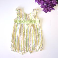 New Without Tags. Ruffles On Shoulder As Accent. Button Up Bottoms Body Suit. Approximate Measurements Length Shoulder To Bottom 15 Inches, Chest 9 Inches. 0072 Multicolor Sleeveless Bubble Romper For Spring, Green Sleeveless Bubble Romper For Spring, Yellow Casual Bubble Romper For Playtime, Yellow Bubble Romper With Ruffles For Spring, Casual Yellow Bubble Romper For Playtime, Green Sleeveless Playful Bubble Romper, Cute Yellow Sleeveless Bubble Romper, Cute Sleeveless Yellow Bubble Romper, Casual Yellow Bubble Romper For Playwear