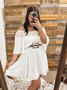 Next to denim, this little white dress is the most versatile piece a woman can own. Our Women's Wrangler Retro® Off The Shoulder Mini Western Dress comes with an elastic waist that flatters and an off-the-shoulder neckline for a little flair. It's crafted from a lightweight fabric that drapes like a dream and keeps you comfortable from one season to the next. Liv is in a size medium Waist: Elastic Length: Above the knee Sleeve Length: Short Sleeve: Cold Shoulder Flowy skirt Elastic Neckline 100% Country Wedding Reception Outfit, Western Engagement Pictures Outfits, White Dress With Boots, Country Summer Dresses, Wedding Rehearsal Outfit, Retro Mini Dress, Wedding Reception Outfit, Engagement Picture Outfits, Reception Outfit