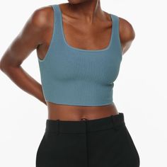 An Everyday Luxury Essential Loved For Its Universally Flattering Fit, This Is A Cropped Tank With A Double Square Neckline And Fully Fashioned Construction. It’s Made With Sculpt Knit Our Signature Figure-Enhancing Yarn. This Compressive, All-Season Fabric Holds You In All The Right Places To Shape And Sculpt Your Form. Like Nothing Else. This Version Is Constructed Using An Ottoman Stitch With Close Distinct Ribs For A Structured And Textural Feel. Features Fully Fashioned Construction Means Y Chic Blue Ribbed Top, Trendy Blue Seamless Top, Chic Stretch Blue Knit Top, Blue Scoop Neck Top With Seamless Construction, Blue Casual Crop Top With Seamless Construction, Fitted Blue Knit Top, Fitted Blue Trendy Knit Top, Trendy Fitted Blue Knit Top, Blue Seamless Scoop Neck Top