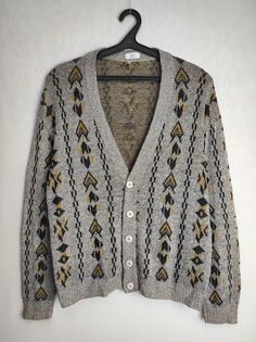 Vintage men's linen blend cardigan Good used condition Size tagged 52, fits like L (please check measurements) Composition: 37% linen, 22% acrylic, 15% modal, 15% viscose, 15% cotton Measurements: Shoulder to shoulder - 22.4″ / 57 cm Pit to pit - 24.4″ / 62 cm Back length from collar - 23.6″ / 60 cm Sleeve length from shoulder - 22.8″ / 58 cm *All measurements are taken with the garment laying flat #4348 Vintage V-neck Cardigan For Layering, Vintage Cotton Sweater For Layering, Retro Fall Cardigan For Layering, Retro Fall Layering Cardigan, Retro Cotton V-neck Outerwear, Vintage Style Long Sleeve Cardigan For Layering, Vintage Long Sleeve Cardigan For Layering, Vintage Cotton V-neck Outerwear, Vintage V-neck Cardigan For Winter