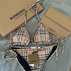 Elevate Your Swimwear Game With This Stunning Burberry Bikini. Crafted With The Finest Materials, This Bikini Is The Perfect Combination Of Luxury And Style. The Beige Color And Iconic Check Pattern Make It A Timeless Piece That You Can Wear Season After Season. The Bikini Is Designed For Women Of All Sizes And Shapes, With A Regular Size Type And A Medium Size. It Features A Classic Bikini Bottom Style That Complements The Overall Look. Perfect For Any Burberry Lover, This Bikini Is A Must-Have Burberry Bathing Suit, Burberry Swim, Designer Swimsuit, Dr Wardrobe, Hogwarts Dr, Women Of All Sizes, Swimsuit Design, Swim Suits, Swimsuit Set