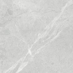 a white marble textured surface with no visible lines or markings on it, as well as the top part of the floor