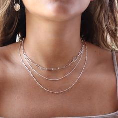 Our Gemma Chain features a timeless, dainty double rope that blends modern style with classic sophistication! It is perfect to wear alone or layer up with a fun necklace stack. DETAILS14k gold fill or sterling silverAvailable in 14", 16", 18", or 20"Hypoallergenic, waterproof, and nickel free Dainty Silver Necklace Stack, White Gold Jewelry Necklaces, Silver Necklace Stack, Homecoming 2024, Dainty Jewelry Necklace, Chain Necklace Silver, Simple Silver Jewelry, Necklace Stack, Sterling Silver Choker