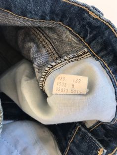 "Waist:26\" Rise:10.5\" Hips:32\" Inseam:6\" These are USA made Movin' On Levis zip fly cutoffs circa the late 70's or early 80's. They're tagged a vintage 28\" but fit a modern 26\" at largest. Please follow the measurements provided above and in the photos for an accurate fit as true vintage runs small and narrow. They're cut to the perfect unisex length and have amazing details on the pockets and feature a rare blue tab. 🍑(5)" Retro Cotton Jean Shorts With Frayed Hem, Vintage High-rise Dark Wash Jean Shorts, Vintage Dark Wash Mid-rise Shorts, Vintage Dark Wash Denim Shorts, Vintage Dark Wash Jean Shorts For Spring, Vintage Style Mid-rise Dark Wash Shorts, Vintage Denim Blue Jean Shorts With Pockets, Vintage Distressed Denim Shorts, Vintage Medium Wash Straight Leg Shorts