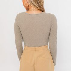 Level up your layering game with this modern take on a basic bodysuit! Glam it up with its stylish button detailing, perfect for transitioning your wardrobe into fall. Who said basic can't be chic? Model is 5'8" wearing a size small Basic Bodysuit, Who Said, Level Up, Layering, Wardrobe, Long Sleeve, How To Wear