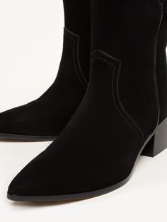 A Western bootie made the Italian way, The Rita Basso is handcrafted from luxuriously soft suede. From the smooth leather piping and tonal stitching to the hand-painted welt, every inch is thoughtfully considered for both style and utility. The mid-calf shaft and mid-height heel mean it pairs well with of-the-moment midi dresses and wide-legged jeans. Fall Suede Boots With Leather Lining, Winter Leather Heeled Boots With Suede Lining, Snip Toe Suede Boots With Suede Lining, High Ankle Suede Boots With Suede Lining, Modern Suede Ankle Boots, High Ankle Leather Heeled Boots With Suede Lining, High Ankle Leather Boots With Suede Lining, Fall Suede Heeled Boots With Leather Sole, Fall Suede Booties With Leather Sole