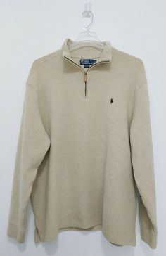 BRAND: POLO RALPH LAUREN SIZE: XXL STYLE: Long Sleeve COLOR: Beige  (Blue pony) FEATURES: Long sleeve 1/4 zip closure sweater. MATERIAL: 100% Cotton.  CRAFTED: Made in Hong Kong.  CONDITION: Very good pre-owned condition. SUMMARY: POLO RALPH LAUREN BEIGE 1/4 ZIP PULLOVER SWEATER BLUE PONY. Size XXL. Condition is Pre-owned. Shipped with USPS Priority Mail. Polo Ralph Lauren Half Zip Sweater, Beige Half-zip Sweater, Ralph Lauren Half Zip, Ralph Lauren Quarter Zip, Polo Quarter Zip, Polo Ralph Lauren Sweater, Quarter Zip Sweater, Striped Sweatshirts, Levi’s 501