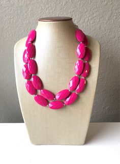 Acrylic faceted richly saturated pink beads make up this double strand necklace. 17 inch necklace with a 4 inch silver extender chain. Each gem has a Silver bead spacer. Need MORE necklaces? Send me a message :) Sending a gift? I'd be happy to wrap this and add a card for no extra charge :-D *Smoke and pet free home!* I ship 6 days a week! This particular necklace is ready to ship! Thank you for browsing my store! Pink Faceted Party Jewelry, Faceted Pink Jewelry For Wedding, Pink Faceted Wedding Jewelry, Valentine's Day Pink Beaded Necklaces, Pink Beaded Necklaces For Party, Pink Round Beaded Necklaces For Party, Adjustable Pink Faceted Necklace, Pink Faceted Round Necklaces, Bridesmaid Lavender