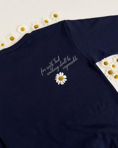 This is a professionally embroidered sweatshirt. 👚MATERIAL  80% cotton 20% polyester ▪️ SIZE  Sizes are unisex. Please check the size chart before you purchase.  💧 CARE:  Machine wash cold, inside-out, gentle cycle with mild detergent and similar colors.   Tumble dry low, or air-dry for longest life. Every item is made to order, creating less fabric waste than conventional manufacturing. Please note that the embroidery comes with a backing that acts as a stabilizer to support the fabric and st Navy Cotton Sweatshirt With Embroidered Logo, Long Sleeve T-shirt With Custom Embroidery In Relaxed Fit, Navy Cotton Sweater With Embroidered Logo, Long Sleeve T-shirt With Embroidered Text For Streetwear, Relaxed Fit Long Sleeve T-shirt With Embroidered Logo, Hand Embroidery Sweatshirt, Christian Crewneck, Faith Scripture, Fabric Waste