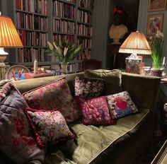 a living room filled with lots of pillows