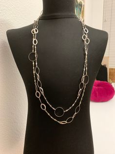 Vintage 1980s silver tone Extra long Chain Necklace with oval and circular design Very cool necklace Great Vintage Condition Can be worn as a long necklace or can be doubled up Comes in a gift box As is Ships Immediately Elegant Silver Long Chain Necklace, Elegant Layered Metal Necklace With Silver Chain, Silver Double Chain Layered Necklace, Silver Layered Double Chain Necklace, Elegant Silver Double Chain Layered Necklace, Formal Long Silver Chain Necklace, Silver Long Chain Necklace For Formal Occasions, Silver Double Strand Metal Necklace, Metal Layered Necklace For Parties