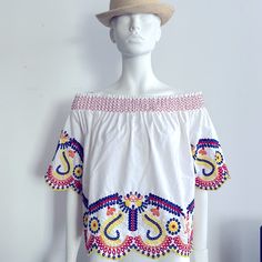 Nwt Off The Shoulder Embroidered Blouse . White With Multi Color Embroidery . Embroidered Multicolor Tops, White Embroidered Blouse For Vacation, White Embroidered Hem Blouse For Vacation, White Geometric Embroidered Short Sleeve Top, White Top With Geometric Embroidery For Vacation, White Short Sleeve Top With Geometric Embroidery, Summer Tops With Contrast Embroidery, White Bohemian Top With Geometric Embroidery For Vacation, Spring Vacation Blouse With Intricate Embroidery