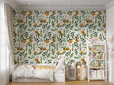 a bedroom with oranges and leaves on the wall