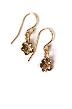 A fun yet simple cherry blossom design, perfect for summer. Gold Filled (nickel and lead-safe) 1", with gold gold filled ear wires We hand select our natural materials, thus there may be slight variations in color and/or size that will not detract from the overall aesthetic Our unique handcrafted designer jewelry for women is made in America, each design created individually in our personal design studio in Floyd VA USA Spring Gold Jewelry With Flower Charm, Dainty Blossom Color Jewelry For Spring, Dainty Blossom Jewelry For Spring, Everyday Gold Flower Charm Earrings, Spring Gift Gold Jewelry, Gold Earrings With Flower Charm For Everyday, Everyday Gold Earrings With Flower Charm, Gold Flower Pendant Jewelry For Spring, Dainty Gold Jewelry For Spring