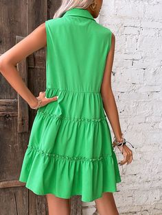 Features: Make a statement on vacation or day-to-day with the Madison Summer Casual Loose Sleeveless Ruffle Beach Dress. Crafted with a lightweight fabric, this dress will keep you feeling cool while looking fashionable. Its elegant design features a ruffle hem and green button detailing. Stay comfortable and stylish all summer long. Green Sleeveless Mini Dress For Summer, Green Ruffled Sleeveless Dress For The Beach, Green Ruffled Sleeveless Beach Dress, Green Sleeveless Dress With Ruffles For Beach, Green Sleeveless Ruffle Dress For Beach, Green Sleeveless Beach Dress With Ruffles, Chic Tiered Sleeveless Dress For Vacation, Green Sleeveless Sundress For Vacation, Green Mini Sleeveless Dress For Summer