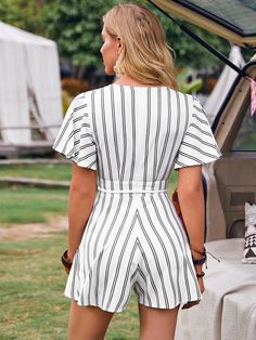 The Butterfly Sleeve Belted Romper is a stylish and professional piece for any wardrobe. This eye-catching romper features a deep V neckline, butterfly sleeves, a self-belted waistline, and striped detailing that creates an elegant look. It is crafted from polyester and elastane fabric, which ensures it is lightweight yet durable enough to withstand frequent wear. The regular fit cut provides comfort while still maintaining its shape over time. For best care results, machine wash or professionally dry clean this romper. Specifications: Style: Casual Pattern Type: Striped Details: Belted, Zipper Length: Short Fit Type: Regular Fit Neckline: Deep V Neck Sleeve Length: Short Sleeve Sleeve Type: Butterfly Sleeve Waist Line: High Waist Fabric: Non-Stretch Composition: 92% Polyester, 8% Elastane White Belted Jumpsuit For Summer, White Belted Jumpsuits And Rompers For Summer, White Belted Jumpsuits And Rompers For Spring, White Belted Jumpsuits And Rompers, White V-neck Jumpsuit With Tie Waist, Chic White Belted Jumpsuits And Rompers, Striped Short Sleeve Jumpsuits And Rompers For Summer, Striped Fitted V-neck Jumpsuit, Striped Fitted Short Sleeve Jumpsuits And Rompers