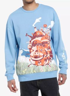 Travel to gorgeous flower fields and beyond with this dreamy sweatshirt on! From Howl's Moving Castle, this sky blue crewneck has a jumbo print of Howl's castle and a scenic backdrop of mountains and flowers. Blue Cartoon Print Sweatshirt For Streetwear, Spring Cartoon Print Relaxed Fit Sweatshirt, Relaxed Fit Cartoon Print Sweatshirt For Spring, Spring Cartoon Print Sweatshirt, Spring Cartoon Print Sweatshirt For Streetwear, Spring Cartoon Print Long Sleeve Sweatshirt, Blue Casual Sweatshirt With Cartoon Print, Spring Cartoon Print Crew Neck Sweatshirt, Spring Cotton Sweatshirt With Cartoon Print