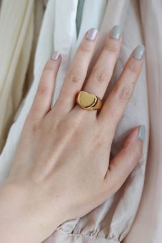 Sasha Heart Gold Signet Ring is a modern chunky heart shaped ring. ◊ 18K Gold Plated Over Brass ◊ Available in US Ring Size 6 to 8 ◊ Delivered in our beautiful custom made Pina Blue box, perfect for gifting! SAY HI TO US Instagram: @thepinablue Pinterest: https://www.pinterest.com/thepinablue Facebook: https://www.facebook.com/thepinablue/ #pinablue Modern Rings For Valentine's Day, Modern Heart-shaped Wedding Rings, Trendy Gold Heart Ring For Anniversary, Modern Heart-shaped Rings For Valentine's Day, Modern Heart Ring For Valentine's Day Gift, Modern Heart-shaped Ring For Everyday Wear, Modern Gold Rings For Valentine's Day, Modern Everyday Heart-shaped Ring, Modern Everyday Heart Ring