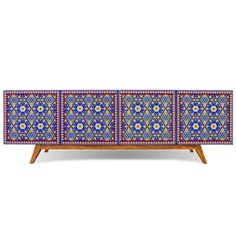 an ornately decorated sideboard with blue and red tiles on the front, inlaided with flowers