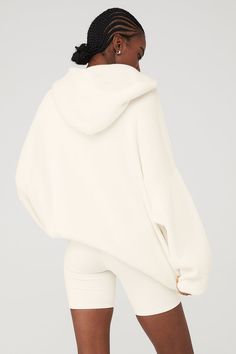 Softest. Hoodie. Ever! Made from ultra-cozy knitted cotton yarn, the Scholar Hooded Sweater is a 10/10. It’s warming yet breathable with classic features like a kangaroo front pocket for stashing small essentials and a ribbed hem and cuffs for a snug fit. A built-in hood and dropped shoulders complete the cozy, off-duty vibe. Pair it with any super-soft sweats in your closet and wear on repeat. Ultra-cozy knitted cotton yarn Built-in hood & kangaroo front pocket Unisex style Designed & uniquely Ivory Sweater, Tank Top Bras, Womens Capris, Cool Hoodies, Back Women, On Repeat, Alo Yoga, Hooded Sweater, Retro Outfits