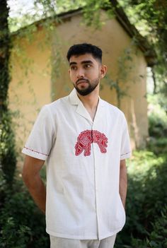 We have a crush on this shirt, because of its kooky hand detailed hand embroidered applique. Crafted in cotton, it also features embroidery details on the sleeves. This product is handcrafted in Pune, India. Subtle variations in patterns are natural to this process. We believe this makes each creation unique and charming. Men Shirts Embroidery, Mens Shirt Illustration, Unique Shirt Designs For Men, Mens Shirts Design Ideas, Men Embroidery Shirts, Embroidery Designs Shirts, Hand Embroidery On Shirt, Shirt Embroidery Ideas For Men, Mens Embroidered Shirt