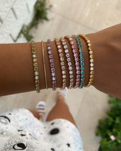 ⚡ ADD TWO OR MORE ITEMS TO THE CART AND ENJOY FREE EXPRESS SHIPPING ⚡ 🚀 DHL - FedEx - UPS (1-4 DAYS DELİVERY) 🚀 ♡ Colored Tennis Zirkon Bracelet Collection ☘ 🍍 🍓 🍇 ☀️ Our fully Iced Single Row Tennis Chain is made with Brass and plated in high-end 14k-22k Yellow/Rose gold finish which guarantee to never fade. All of the lab made diamonds use on this pendant are all handset by our in house specialist. It is the perfect piece for those who are looking for a subtle statement necklace with a to Rose Gold Hand Set Tennis Bracelet For Wedding, Gold Cubic Zirconia Tennis Bracelet For Wedding, Dainty Adjustable Tennis Bracelet For Wedding, Dainty Wedding Tennis Bracelet Adjustable, Adjustable Gold Bracelet With Cubic Zirconia For Wedding, Pink Tennis Bracelet With 17 Jewels For Wedding, Gold Tennis Bracelet With Sparkling Stones As A Gift, Gold Tennis Bracelet With Sparkling Stones For Gift, Yellow Gold Bracelets With Sparkling Stones For Party