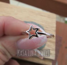 Moon and star Sterling silver ring sizes 3-12 over SOLID sterling stamped 925 silver Tarnish free *IF YOUR SIZE ISNT SHOWING, MESSAGE ME. I might be sold out and will be able to replenish shortly* This is an 6.1mm band and band width is 1.6mm and shank is approx 1.9 This is all done in slid sterling silver with Rhodium plating to prevent tarnishing Nothing but the best from my custom jewelry store. Email me if you have any questions. Nickel-free Star-shaped Promise Ring, Minimalist Star-shaped White Gold Rings, Minimalist White Gold Star-shaped Ring, Minimalist White Gold Star Shaped Ring, Sterling Silver Stackable Star Rings, Silver Star-shaped Stackable Rings In Sterling Silver, Sterling Silver Star-shaped Promise Ring, Sterling Silver Star Shaped Promise Ring, Silver Star-shaped Stackable Promise Rings