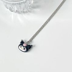 📿 Sanrio Kawaii Necklace Pendant - Adorn Yourself with Cuteness 📿 ✨ Charming Adornment: The Sanrio Kawaii Necklace Pendant isn't just any necklace; it's a delightful accessory that adds charm and style to your attire. Featuring various beloved Sanrio characters, this pendant brings a touch of cuteness to your fashion choices. 💖 Charming Design: With iconic Sanrio characters adorning this pendant, every time you wear it, you celebrate the timeless charm and cuteness of your favorite friends. I Cute Black Jewelry With Charms, Harajuku Style Black Jewelry, Silver Kawaii Necklace For Gift, Silver Kawaii Necklace As Gift, Adjustable Cute Kawaii Jewelry, Adjustable Kawaii Jewelry With Cute Design, Kawaii Pendant Jewelry For Gifts, Kawaii Jewelry With Cute Adjustable Design, Kawaii Pendant Jewelry Gift