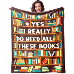 a woman holding up a book cover with bookshelves on it and the words yes really do need all these books