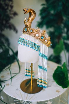 new turquoise Cleopatra crown 💙🐍🌞✨ #carbickova #carbickovacrowns #crown #headband #headpiece #tiara #headdress #halo #jewellery #jewelry #jewelleryaddict #jewelryaddiction #handmadejewelry #Cleopatra ##cleopatramakeup #cleopatracostume #costume #etsy #festivalfashion #coachella #festival #festivaloutfit #burningman #halloween #halloweencostume #turquoise #turquoisejewelry #pearl #pearljewelry Halloween Costume Goddess, Cleopatra Crown, Egyptian Crown, Egyptian Headpiece, Gold Halo Crown, Cleopatra Style, Egyptian Accessories, Fantasy Crown, Egypt Jewelry