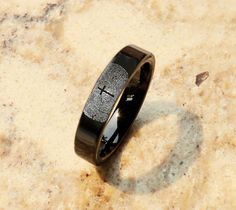 a black ring with a fingerprint on it