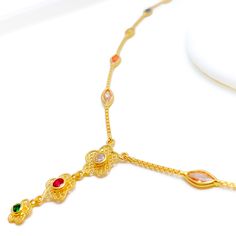 This 22k gold necklace, weighing 7.2 grams, captivates with its textured floral design, intricately detailed and adorned with cubic zirconia for added sparkle. The yellow gold finish enhances the texture, bringing the floral motif to life. The necklace length is 16 inches, with a drop of 1 inch, positioning the pendant perfectly to draw attention. Secured with an S-lock, this necklace is as reliable as it is beautiful. Perfect for those who appreciate the elegance of nature-inspired jewelry, it Gold Cubic Zirconia Necklace For Festive Occasions, Gold Cubic Zirconia Kundan Necklace With Elegant Design, Gold Kundan Necklace With Elegant Cubic Zirconia Design, Gold Cubic Zirconia Bridal Necklace In Temple Jewelry Style, Traditional 22k Gold Necklace With Delicate Chain, Festive Yellow Gold Cubic Zirconia Necklace, Hand-set 22k Gold Necklace, Festive Gold Bridal Necklace With Cubic Zirconia, Festive Gold Cubic Zirconia Bridal Necklace