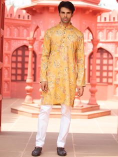 This yellow floral cotton print kurta will instantly give an elegant look.  Made from cotton fabric, this yellow kurta with floral print has front buttons fastening, and a mandarin collar. It is paired with a white cotton stretch churidar pants. An ideal outfit for traditional & special events.

Size Chart For Men





	
	
					Men's Size Chart
		

		
		
						
				Size Chart For Men
				Custom Size Measurement Guide
			
			
				
				
				Custom Size Measurement Guide
1. Take your measurements a Yellow Floral Print Kurta For Diwali, Festive Yellow Kurta With Floral Print, Festive Yellow Printed Kurta, Yellow Floral Print Kurta For Festive Occasions, Yellow Printed Unstitched Kurta, Yellow Cotton Kurta With Printed Motifs, Yellow Kurta With Printed Motifs For Diwali, Yellow Printed Kurta For Spring, Traditional Mustard Cotton Kurta