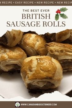 the best ever british sausage rolls recipe is on a white platter with holly leaves