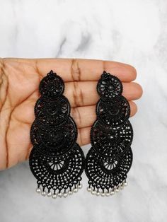 Check out this item in my Etsy shop https://www.etsy.com/listing/894250170/oxidized-black-metal-jhumka-earring Oxidised Mangtika, Black Indian Jewelry, Black Jhumka, Oxidized Jhumka, Mehndi Designs Front Hand, Western Earrings, Jhumki Earrings, Gold Jewelry Sets, Bollywood Jewelry