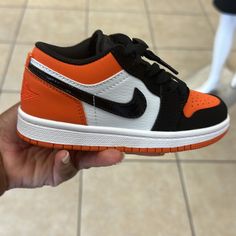 Orange And Black Jordan 1s Low Size 11 Preschool Low-top Non-slip Jordan Shoes For Streetwear, Sporty Non-slip Low-top Jordan Shoes, Orange Low-top Sneakers For School, Casual Orange Sneakers For School, Orange And Black Jordan 1, Jordan 1s Low, Jordan 1 Mid Blue, December Outfits, Grey Jordans