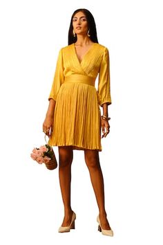 Yellow ruched criss cross dress with fitted bodice and flared skirt. - Aza Fashions Pleated V-neck Dress With Fitted Bodice, Fit And Flare V-neck Dress With Pleated Waist, V-neck Fit And Flare Dress With Pleated Waist, Spring Formal Ruched V-neck Dress, Chic Fitted Pleated V-neck Dress, Fitted Pleated V-neck Dress For Evening, V-neck Dress With Fitted Waist For Brunch, V-neck Dress With Ruched Bodice For Brunch, Ruched V-neck Fitted Bodice Dress