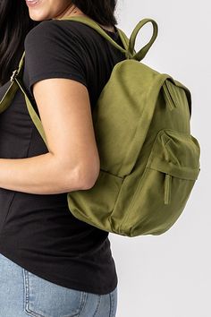 The Zem Mini Backpack is small but mighty—making it the perfect school pack for smaller people or an everyday pack for anyone who has taken Thoreau’s " Simplify, simplify, simplify" advice to heart. While this everyday carry backpack is scaled down, it still has all the durability and organizational features needed for school, work or outdoor activities. Made from the same heavy-duty 14-oz organic cotton canvas as our full-sized Earth Pack in a Fair Trade Certified™ factory, the Zem Mini Backpac Everyday Standard Backpack, Solid Canvas School Backpack, Solid Color Canvas School Backpack, Versatile Softback Backpack For Back To School, Green Standard Backpack For Everyday Use, Green Backpack For Everyday Use, Versatile Student Backpack Softback, Versatile Student Backpack With Softback, Versatile Student Backpack