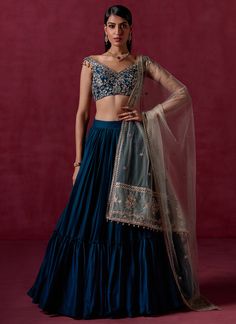 Our Teal Blue Embroidered Crepe Silk Lehenga includes a crepe silk top with santoon inner, crepe silk bottom with santoon inner, and a net dupatta. Embroidery is present on this style using sequins, thread, and zari embellishments. Like all of our pieces, this piece is made in India and checked by hand to ensure high q Turquoise Lehenga, Fashion Course, Dupatta Embroidery, Engagement Lehenga, Blouse Lehenga, Kurta Lehenga, Lehenga Pattern, Floral Veil, Henna Night